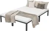 A white mattress with a brown blanket and pillows on a dark gray metal bed frame, shown from a slight angle. Náhled obrázku produktu
