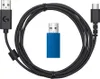 A black USB cable with a USB-A connector on one end and a USB-C connector on the other, along with a blue USB dongle, are laid out on a white background. Náhľad obrázku produktu