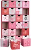 A pink advent calendar with 24 small drawers, decorated with Christmas motifs and numbers. Náhled obrázku produktu