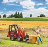 Bruder Schäffer Hoflader 2630 mit Ballengreifzange und 1 Produktbild-Vorschau 14
