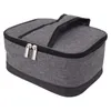 A gray insulated lunch bag with black trim and two silver zipper pulls is shown against a white background. Náhľad obrázku produktu