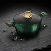 A green pot with gold accents sits on a dark, textured surface, surrounded by green and gold decorative elements. Produktbild-Vorschau