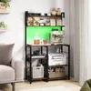 A kitchen shelf unit with various items, including a coffee machine, printer, and decorative items, set up in a home environment next to a sofa. Náhled obrázku produktu