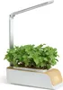 A smart indoor herb garden with a built-in LED grow light. Produktbild-Vorschau