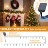 Christmas decorations including a fireplace with stockings, a Christmas tree, and a garland, with product specifications overlaid. Náhled obrázku produktu