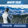 A person flying a drone in a snowy mountain landscape. Produktbild-Vorschau