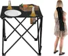 A portable folding table with drinks and a basket of fruit, and a woman carrying a folded table. Produktbild-Vorschau