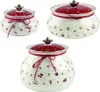 Three ceramic jars with lids, decorated with festive motifs. Náhled obrázku produktu