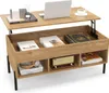 A wooden coffee table with a lift-top mechanism and storage compartments, displaying various items like books, a laptop, and a vintage radio. Anteprima dell’immagine prodotto