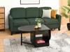 A living room scene with a green sofa, a black coffee table, and a rug. Náhľad obrázku produktu