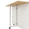 A close-up, angled view of a white kitchen island with a wooden countertop, showing its side and a partially open door. Podgląd zdjęcia produktu