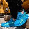 A person wearing blue safety shoes with yellow text, standing on a wooden surface with a yellow construction vehicle in the background. Produktbild-Vorschau