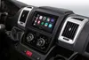 The interior of a vehicle's dashboard, focusing on the infotainment system. Produktbild-Vorschau