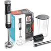 A hand blender set with accessories, including a whisk, measuring cup, and charging cable, displayed on a white background with a product box. Produktbild-Vorschau