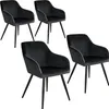 Four black upholstered dining chairs with black metal legs are arranged in a staggered formation against a white background. Náhled obrázku produktu