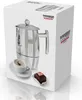 A product box for a coffee maker, with an image of the coffee maker, a cup of coffee, and a chocolate pastry on the front. Produktbild-Vorschau