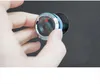 A hand is shown turning a digital peephole viewer on a door. Produktbild-Vorschau