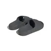 A pair of gray Adidas Adilette 22 slides on a white background. Podgląd zdjęcia produktu