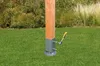 A wooden post is secured in the ground with a metal base and a crank mechanism attached. Produktbild-Vorschau