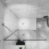 A modern bathroom corner with a glass shower enclosure. Produktbild-Vorschau