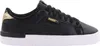 A black Puma sneaker with gold accents on a white background. Podgląd zdjęcia produktu