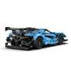 A blue and black toy sports car with a large rear spoiler, shown from a rear-side angle on a white background. Produktbild-Vorschau