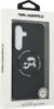 A black phone case with Karl Lagerfeld branding and graphics, displayed in its retail packaging. Produktbild-Vorschau