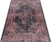 A rug with a distressed, vintage-inspired pattern. Náhled obrázku produktu