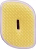 A close-up, top-down view of a hairbrush. Produktbild-Vorschau