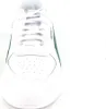 A close-up, front-facing view of a white Puma sneaker with green accents. Produktbild-Vorschau