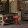 A kitchen scene with a bar stool in the foreground. Náhled obrázku produktu