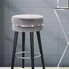 A gray bar stool with black legs and a silver ring accent, placed in front of a tiled wall. Náhľad obrázku produktu