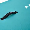 A close-up of a teal paddleboard with a black handle that has the brand name 'AQUA MARINA' printed on it in white. Produktbild-Vorschau