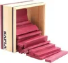 A wooden box filled with red wooden blocks, with some blocks spilling out. Produktbild-Vorschau