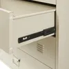 Close-up view of an open drawer in a metal cabinet, showing a drawer slide. Produktbild-Vorschau