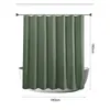 A green shower curtain hanging over a bathtub, with dimensions indicated. Produktbild-Vorschau