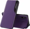 A purple flip case for a smartphone, shown open and standing up. Produktbild-Vorschau