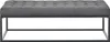 A grey upholstered bench with a black metal frame, presented against a white background. Anteprima dell’immagine prodotto