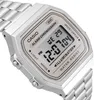 A close-up shot of a silver Casio digital watch with a metal band. Voir les images du produit