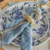 A table setting with a plate and napkin. Produktbild-Vorschau