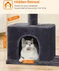 A cat is sitting inside a cat house on a cat tree. Dimensions are shown with text overlays. Produktbild-Vorschau