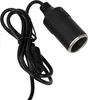 A black car cigarette lighter adapter with a cord against a white background. Produktbild-Vorschau