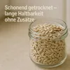 A glass jar filled with sunflower seeds, with text overlay. Produktbild-Vorschau