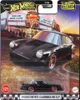A Hot Wheels Premium die-cast car packaging featuring a Porsche 911 Carrera RS 2.7 in front of a movie theater. Produktbild-Vorschau