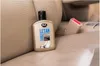 A bottle of K2 LETAN cleaner and conditioner sits on a car seat. Podgląd zdjęcia produktu