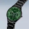 A close-up shot of a black and green Bering watch with a metal band. Anteprima dell’immagine prodotto