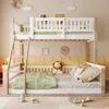 A children's bunk bed with a ladder, decorated with playful elements like a lion plush toy and cloud decorations. Produktbild-Vorschau