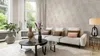 A living room scene with a sofa, coffee table, and decorative items. Produktbild-Vorschau