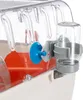 Close-up of a hamster cage accessory, specifically a water bottle holder and dispenser attached to the cage wall. Produktbild-Vorschau
