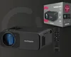 A product shot of a black Overmax projector, its remote control, and its packaging, set against a dark background with subtle graphic elements. Voir les images du produit